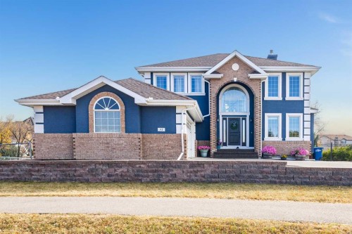 52 Canoe Road Sw, Airdrie, AB - Outdoor With Facade