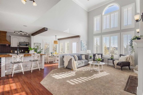 52 Canoe Road Sw, Airdrie, AB - Indoor With Fireplace