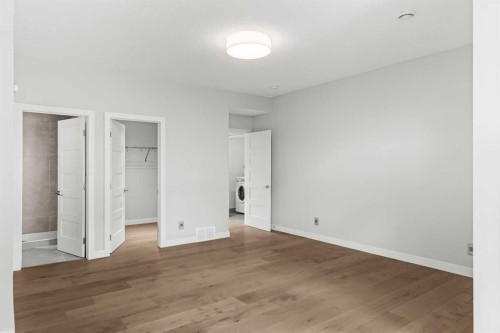 204-105 Stewart Creek Rise Sw, Canmore, AB - Indoor Photo Showing Other Room