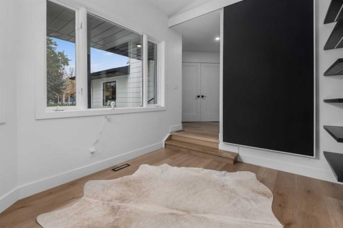 129 Sundown Place Se, Calgary, AB - Indoor Photo Showing Other Room