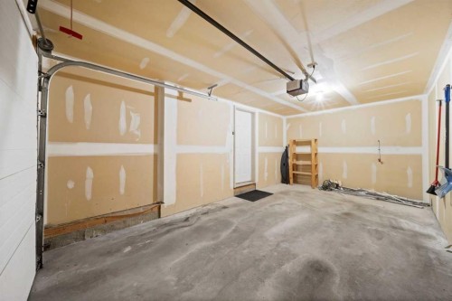213 Copperfield Lane Se, Calgary, AB - Indoor Photo Showing Garage