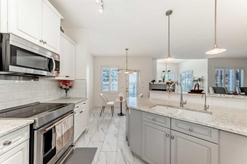 82 Mt Gibraltar Heights Se, Calgary, AB - Indoor Photo Showing Kitchen With Stainless Steel Kitchen With Upgraded Kitchen