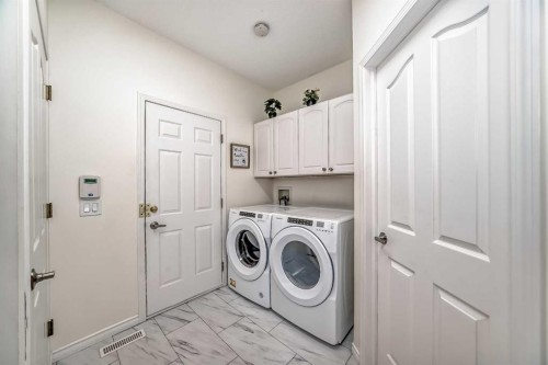 82 Mt Gibraltar Heights Se, Calgary, AB - Indoor Photo Showing Laundry Room
