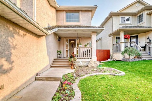 82 Mt Gibraltar Heights Se, Calgary, AB - Outdoor With Deck Patio Veranda With Facade
