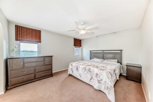 82 Mt Gibraltar Heights Se, Calgary, AB - Indoor Photo Showing Bedroom