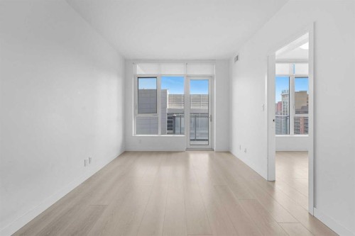 1007-108 Waterfront Court Sw, Calgary, AB - Indoor Photo Showing Other Room