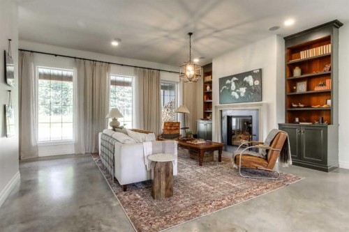 11-29327 Range Road 52, Rural Mountain View County, AB - Indoor Photo Showing Living Room With Fireplace