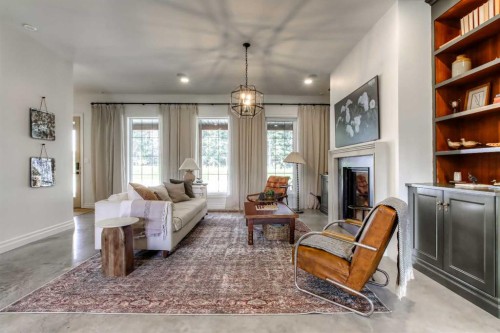 11-29327 Range Road 52, Rural Mountain View County, AB - Indoor Photo Showing Living Room With Fireplace