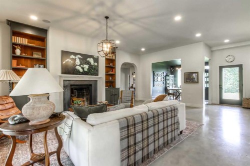 11-29327 Range Road 52, Rural Mountain View County, AB - Indoor Photo Showing Living Room With Fireplace