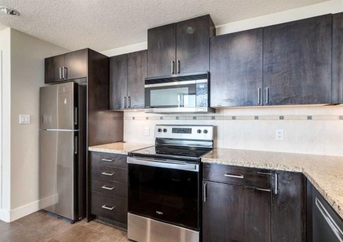1801-77 Spruce Place Sw, Calgary, AB - Indoor Photo Showing Kitchen