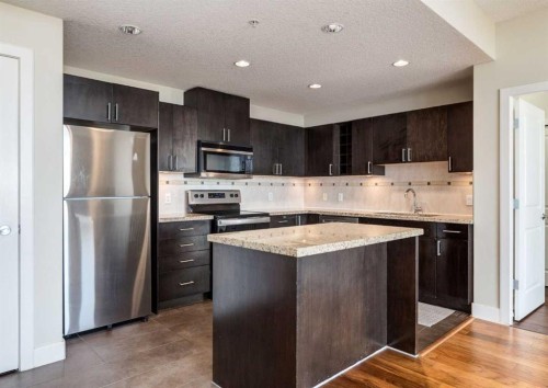 1801-77 Spruce Place Sw, Calgary, AB - Indoor Photo Showing Kitchen With Upgraded Kitchen