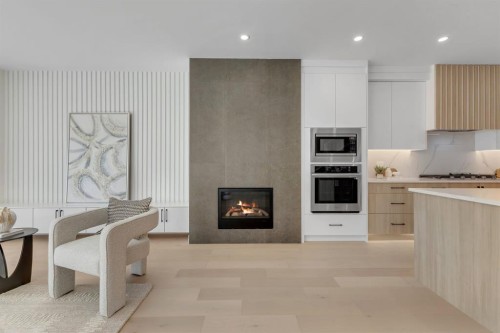 415 37 Avenue Nw, Calgary, AB - Indoor Photo Showing Kitchen With Fireplace