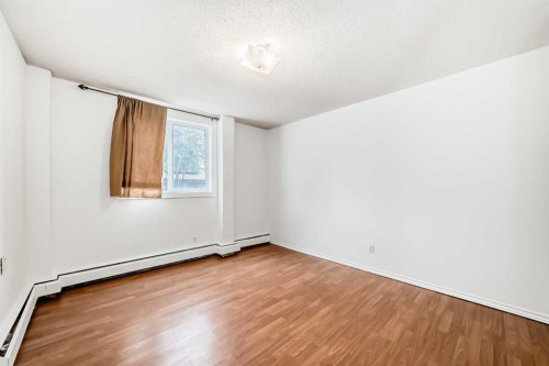 4A-80 Galbraith Drive Sw, Calgary, AB - Indoor Photo Showing Other Room