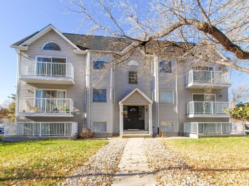 3 Alberta Avenue, Okotoks, AB - Outdoor With Facade