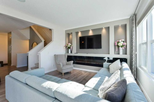 28 Auburn Glen Close Se, Calgary, AB - Indoor Photo Showing Living Room With Fireplace