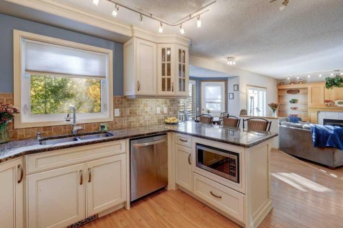 2423 Morris Crescent Se, Airdrie, AB - Indoor Photo Showing Kitchen With Stainless Steel Kitchen With Double Sink