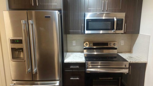 4207-755 Copperpond Boulevard Se, Calgary, AB - Indoor Photo Showing Kitchen