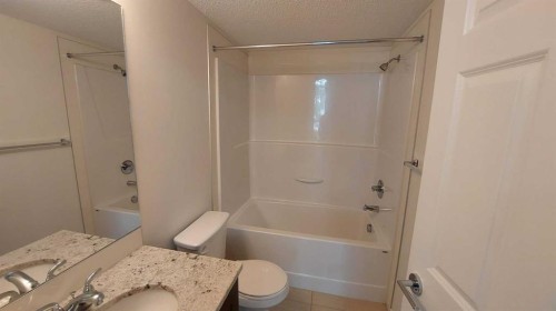 4207-755 Copperpond Boulevard Se, Calgary, AB - Indoor Photo Showing Bathroom