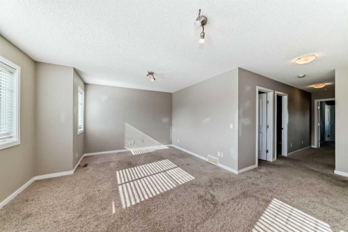 144 Reunion Grove Nw, Airdrie, AB - Indoor Photo Showing Other Room