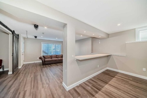 144 Reunion Grove Nw, Airdrie, AB - Indoor Photo Showing Other Room