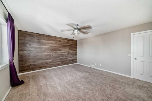144 Reunion Grove Nw, Airdrie, AB - Indoor Photo Showing Other Room