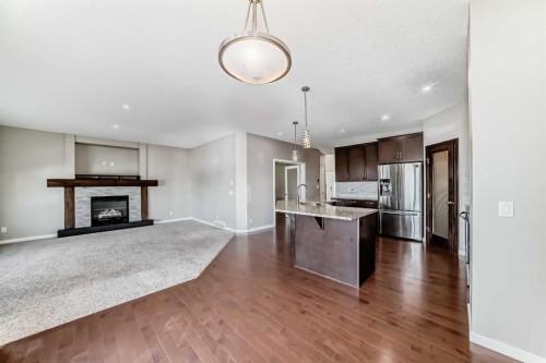144 Reunion Grove Nw, Airdrie, AB - Indoor With Fireplace