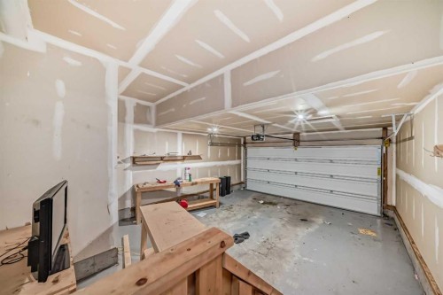 144 Reunion Grove Nw, Airdrie, AB - Indoor Photo Showing Garage