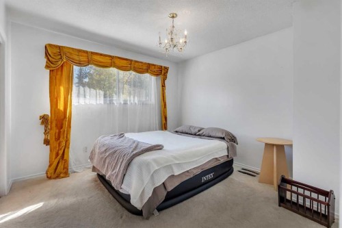 3224 Carol Drive Nw, Calgary, AB - Indoor Photo Showing Bedroom