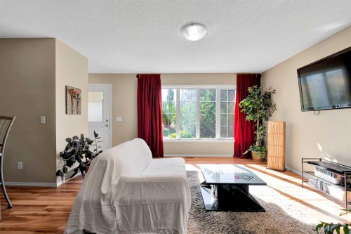 14 Windstone Lane Sw, Airdrie, AB - Indoor Photo Showing Living Room