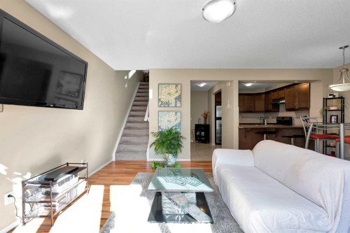 14 Windstone Lane Sw, Airdrie, AB - Indoor Photo Showing Living Room