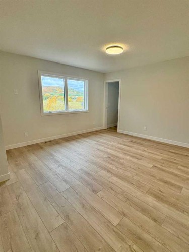 679 Anderson Close Nw, Diamond Valley, AB - Indoor Photo Showing Other Room
