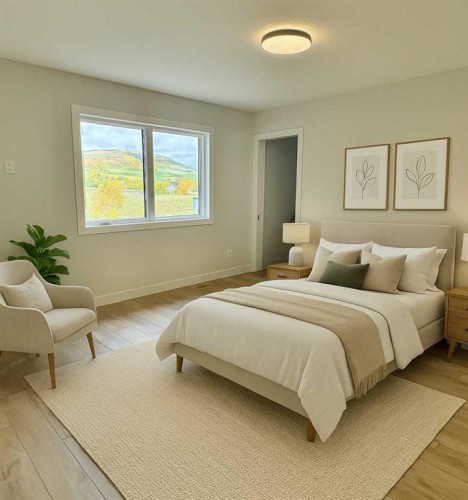 679 Anderson Close Nw, Diamond Valley, AB - Indoor Photo Showing Bedroom