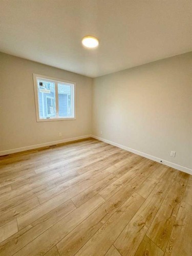 679 Anderson Close Nw, Diamond Valley, AB - Indoor Photo Showing Other Room