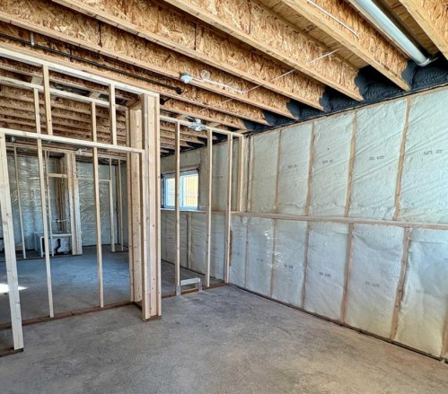 679 Anderson Close Nw, Diamond Valley, AB - Indoor Photo Showing Basement