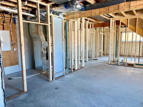 679 Anderson Close Nw, Diamond Valley, AB - Indoor Photo Showing Basement