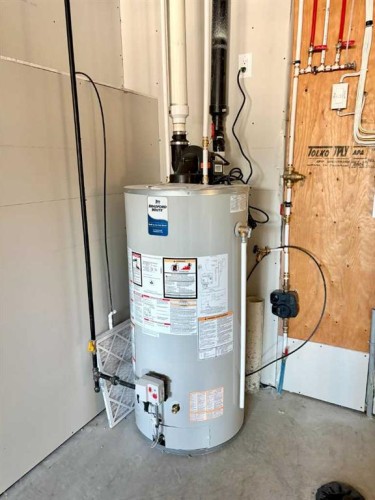 679 Anderson Close Nw, Diamond Valley, AB - Indoor Photo Showing Basement