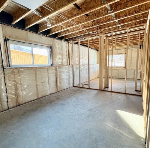 679 Anderson Close Nw, Diamond Valley, AB - Indoor Photo Showing Basement