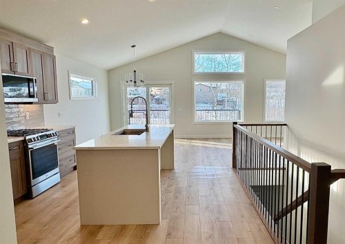 679 Anderson Close Nw, Diamond Valley, AB - Indoor Photo Showing Kitchen