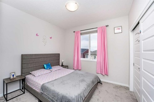 717 Windrow Manor Sw, Airdrie, AB - Indoor Photo Showing Bedroom