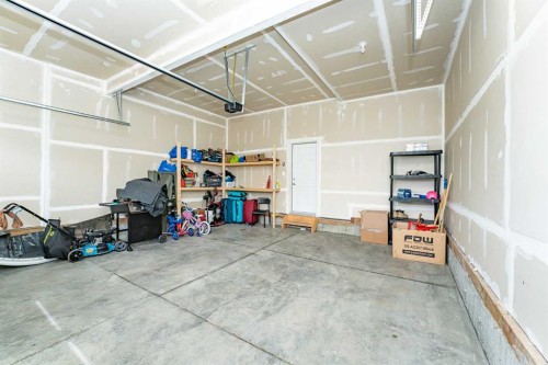 717 Windrow Manor Sw, Airdrie, AB - Indoor Photo Showing Garage