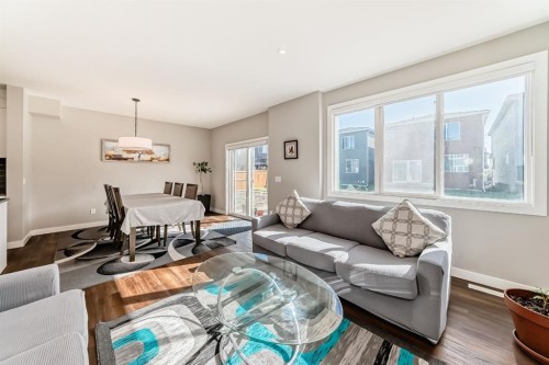 321 Carringvue Place Nw, Calgary, AB - Indoor Photo Showing Living Room