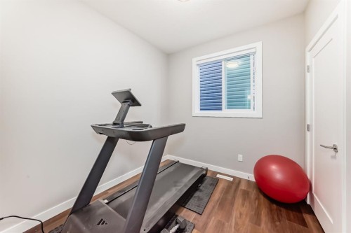 321 Carringvue Place Nw, Calgary, AB - Indoor Photo Showing Gym Room