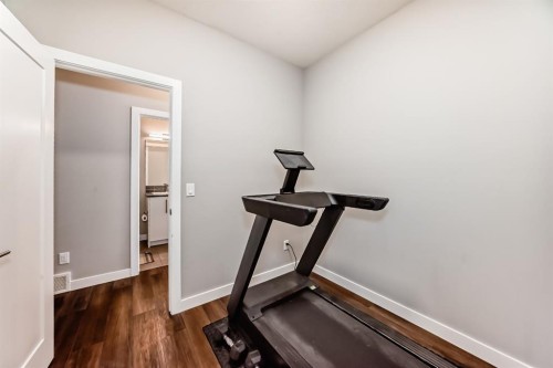 321 Carringvue Place Nw, Calgary, AB - Indoor Photo Showing Gym Room