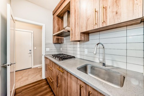 321 Carringvue Place Nw, Calgary, AB - Indoor Photo Showing Kitchen