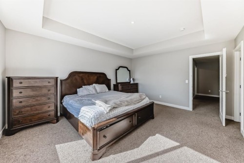 321 Carringvue Place Nw, Calgary, AB - Indoor Photo Showing Bedroom