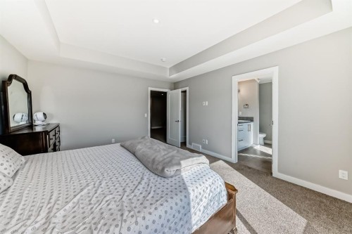 321 Carringvue Place Nw, Calgary, AB - Indoor Photo Showing Bedroom