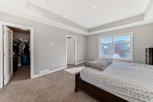 321 Carringvue Place Nw, Calgary, AB - Indoor Photo Showing Bedroom