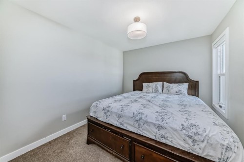 321 Carringvue Place Nw, Calgary, AB - Indoor Photo Showing Bedroom