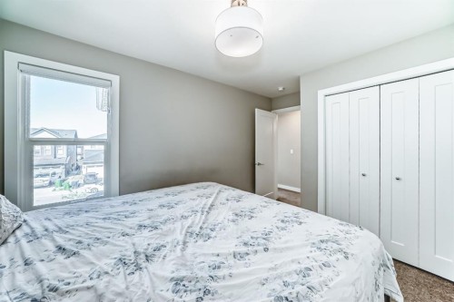 321 Carringvue Place Nw, Calgary, AB - Indoor Photo Showing Bedroom