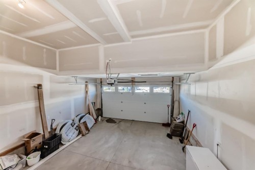 321 Carringvue Place Nw, Calgary, AB - Indoor Photo Showing Garage